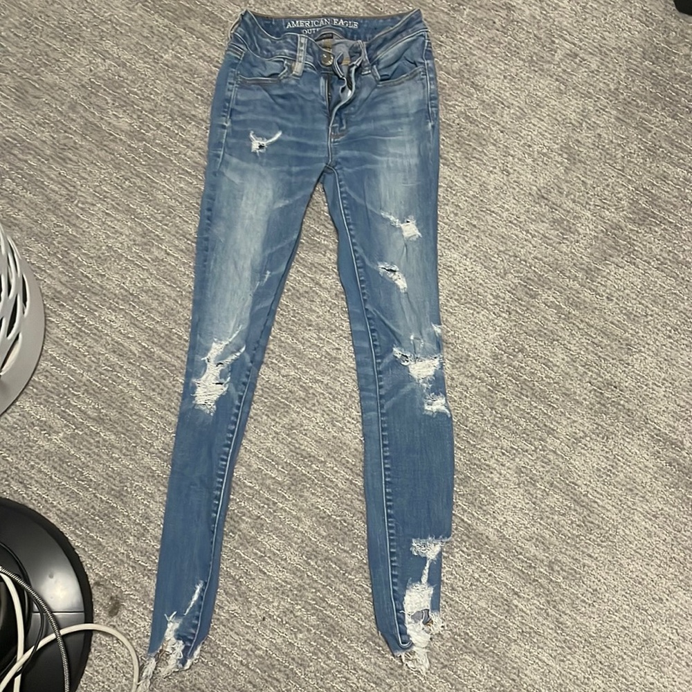 american eagle jeans ripped,super stretch, size 00